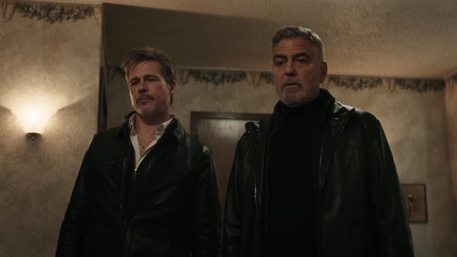 Brad Pitt e George Clooney mostram os dentes no primeiro trailer do thriller psicológico Wolfs