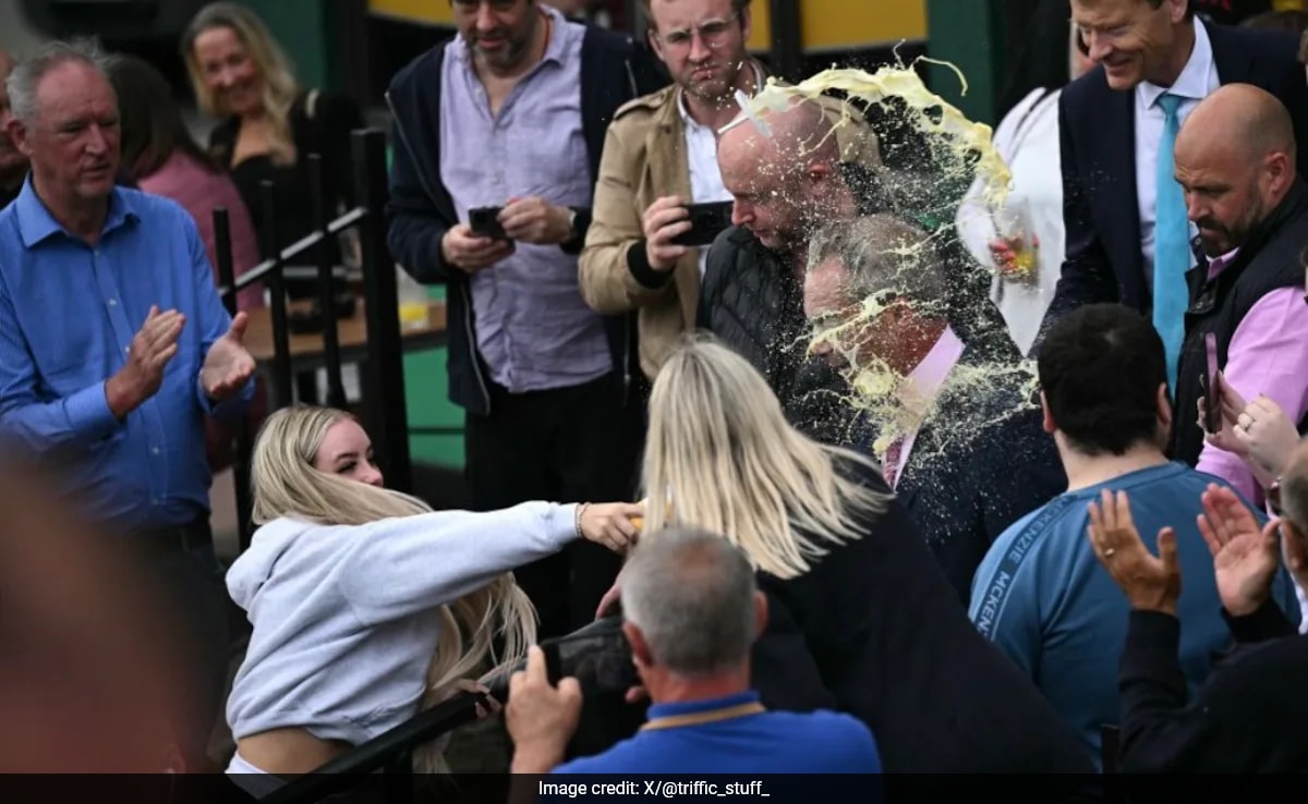 Mulher, 25 anos, acusada de agressão após milkshake jogado em Nigel Farage