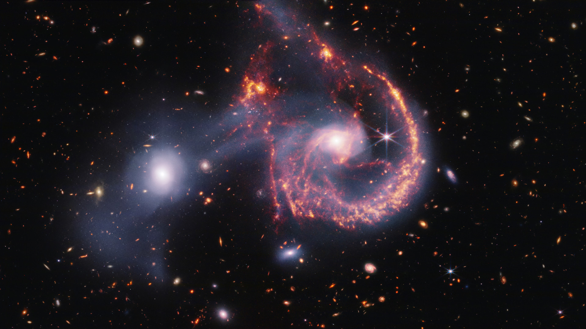 Foto espacial da semana: Galáxias entrelaçadas formam rosto sorridente cósmico em nova imagem do telescópio James Webb