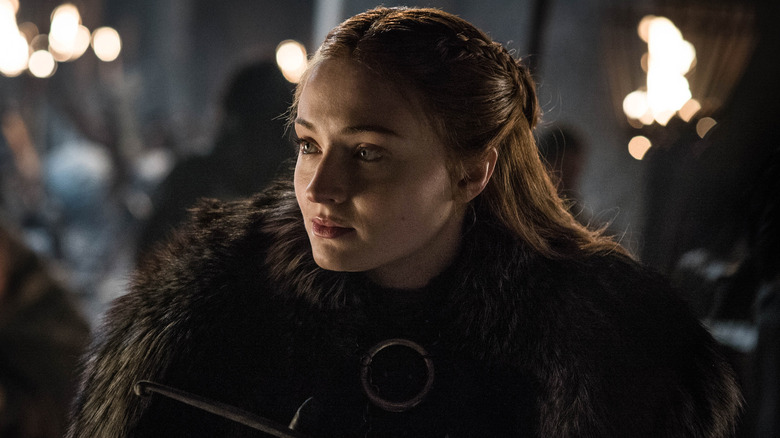 Sansa com vestes de pele e cabelos trançados de Game of Thrones